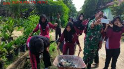 Gotong Royong Lawan DBD, Warga Desa Air Emas Bersihkan Lingkungan dan Drainase